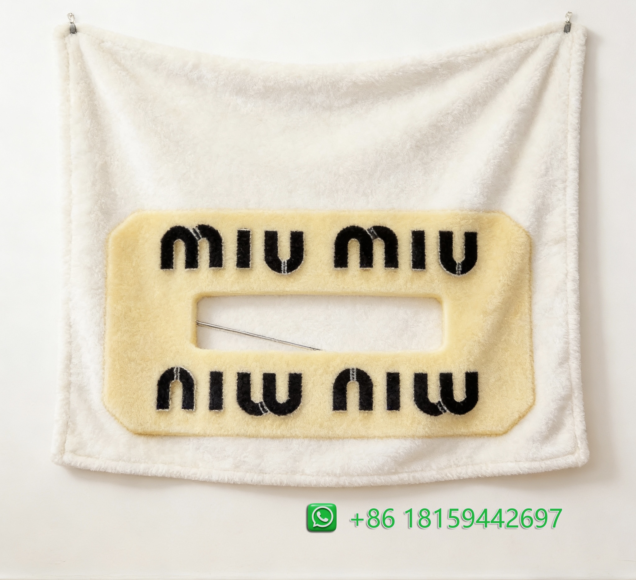 Miumiu Throw Blankets